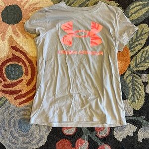 Under armor shirt with pink logo.